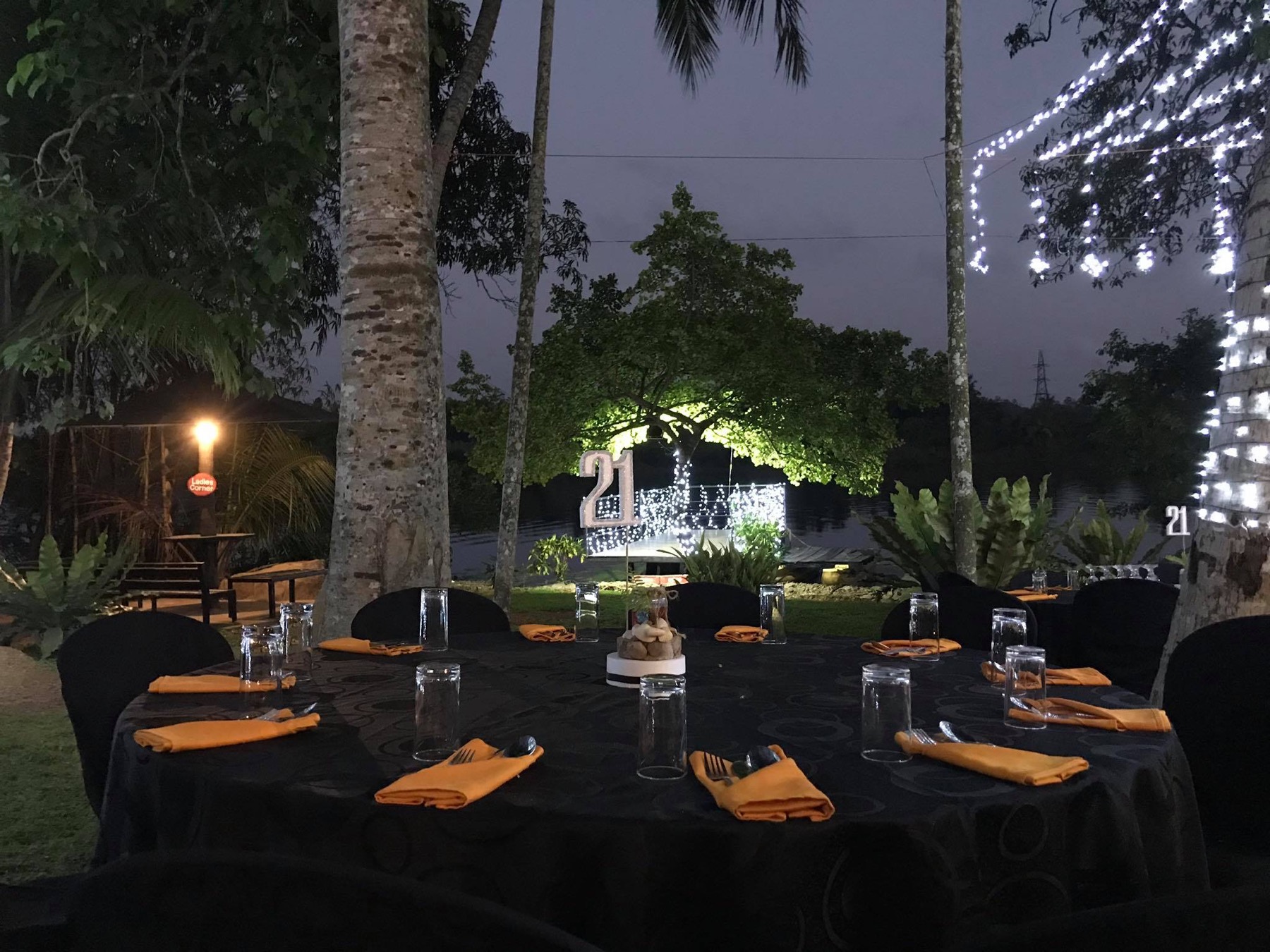 Evening celebration tables beside Bolgoda Lake at Paaruwa