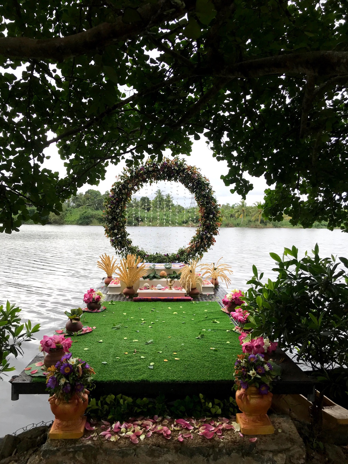 Lakefront wedding ceremony beneath the trees at Paaruwa